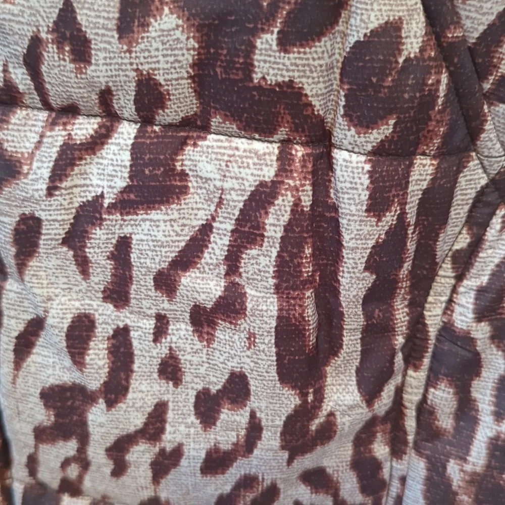CAbi, Juliet animal print puffer vest. Medium